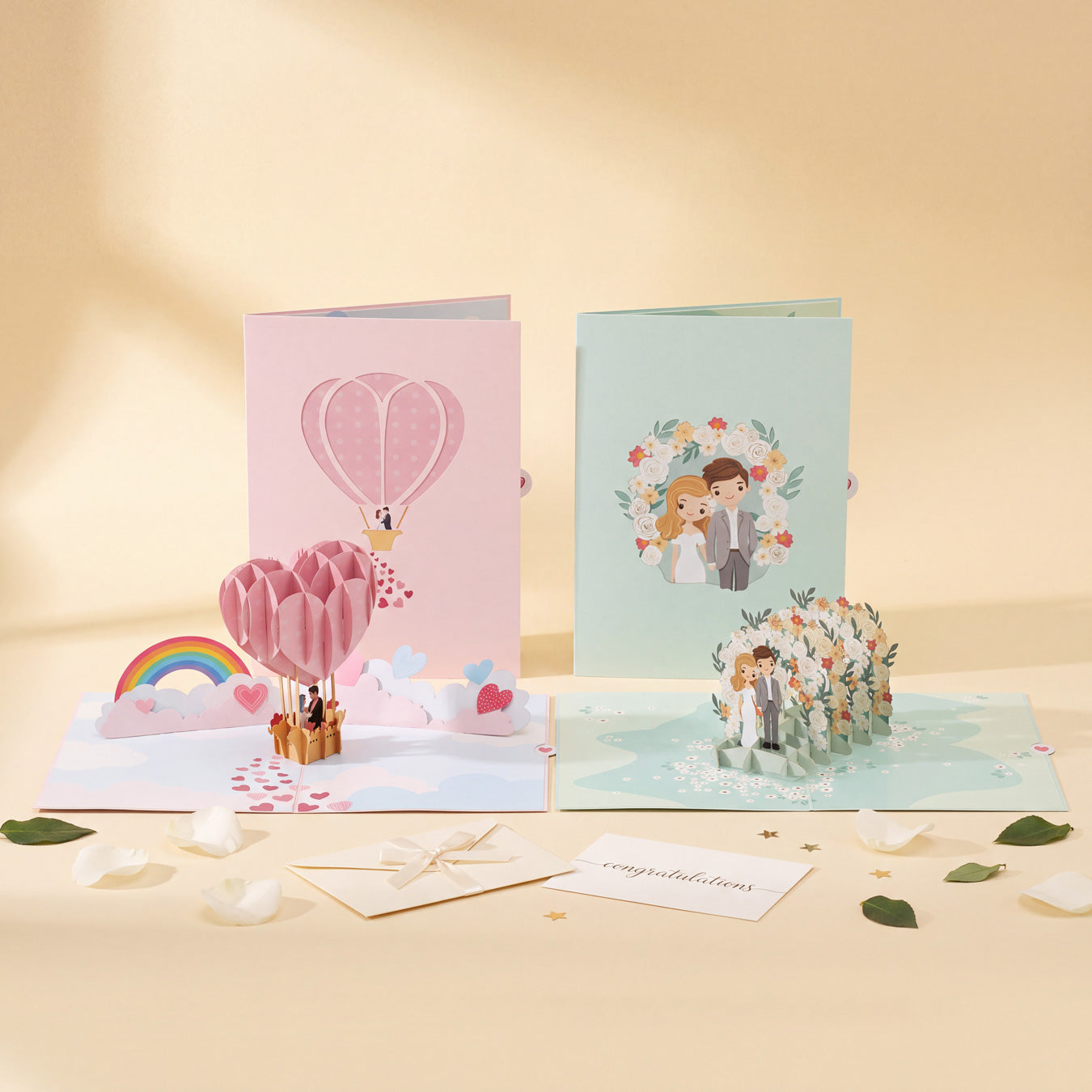 3D pop-up congratulations cards: Up in the Clouds and Through the Garden Gate, open with rose petals and a note card