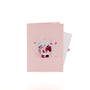 A Toast to Us 3D pop-up card closed — card only, pink cover with the toasting couple inside a heart, everpop