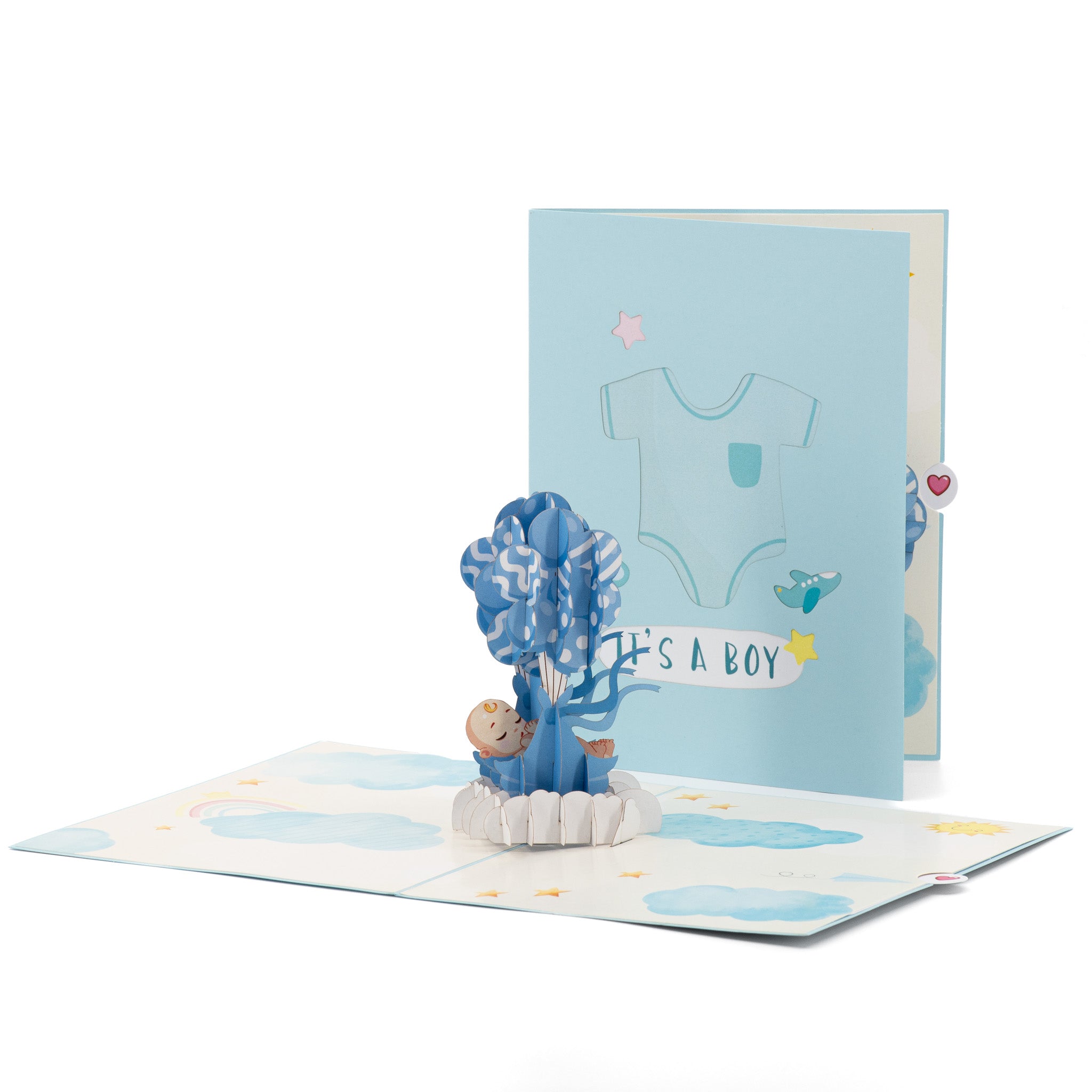 Baby Boy and Balloons 3D pop-up card front view: baby lifted by blue balloons, It's a Boy cover behind, everpop