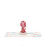 Baby Girl and Balloons 3D pop-up card angle view: pink balloon bundle over a cloud base with rainbow, everpop