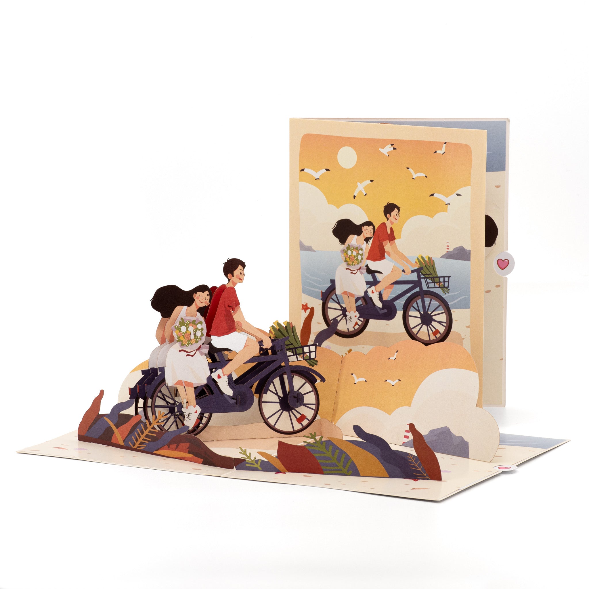Biking With You 3D pop-up card front view: couple riding a bicycle by the sea, sunset cover behind, everpop