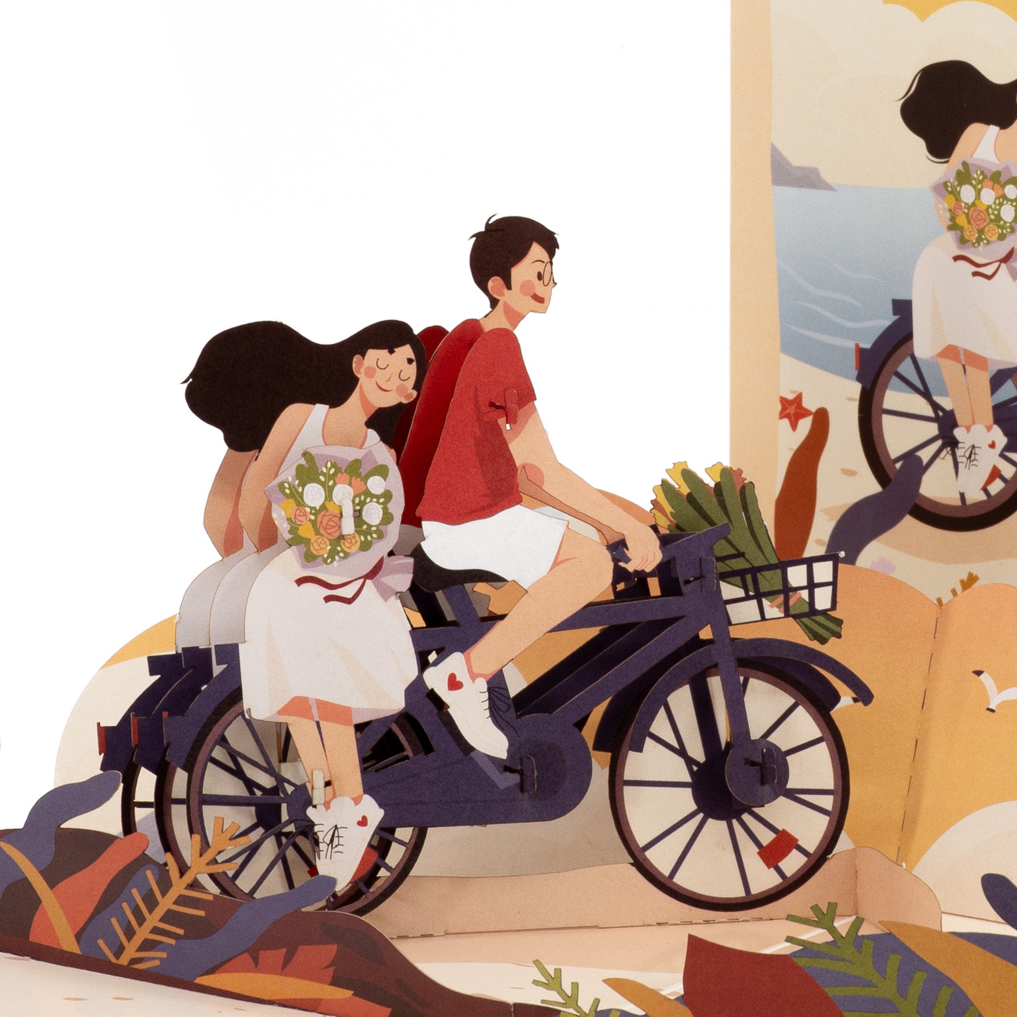 Biking With You 3D pop-up card close-up: pair on a bike with flowers in the basket and seagulls, everpop