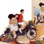 Biking With You 3D pop-up card close-up: pair on a bike with flowers in the basket and seagulls, everpop