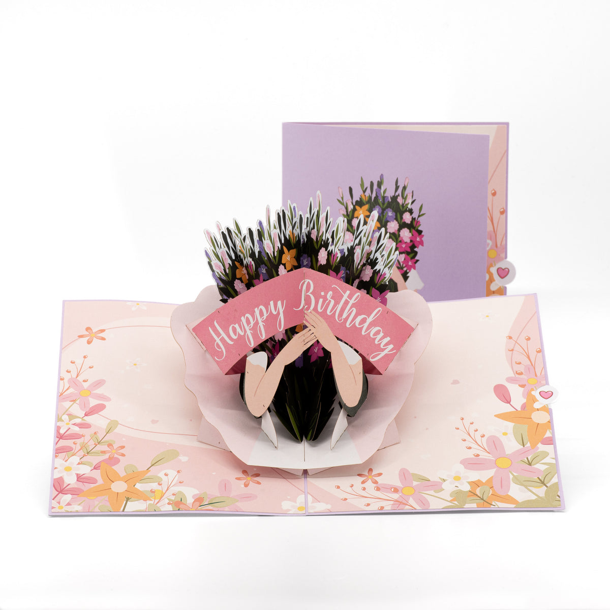 Birthday Bouquet 3D pop-up card front view: hands holding a wildflower bouquet, lilac cover behind, everpop