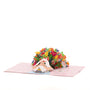 Blooms For You 3D pop-up card angle view: rainbow bouquet pop-up on a striped pink base, everpop