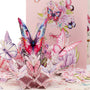 Cherry Blossom & Butterflies 3D pop-up card close-up: pink, purple and blue paper butterflies on soft blossoms, everpop