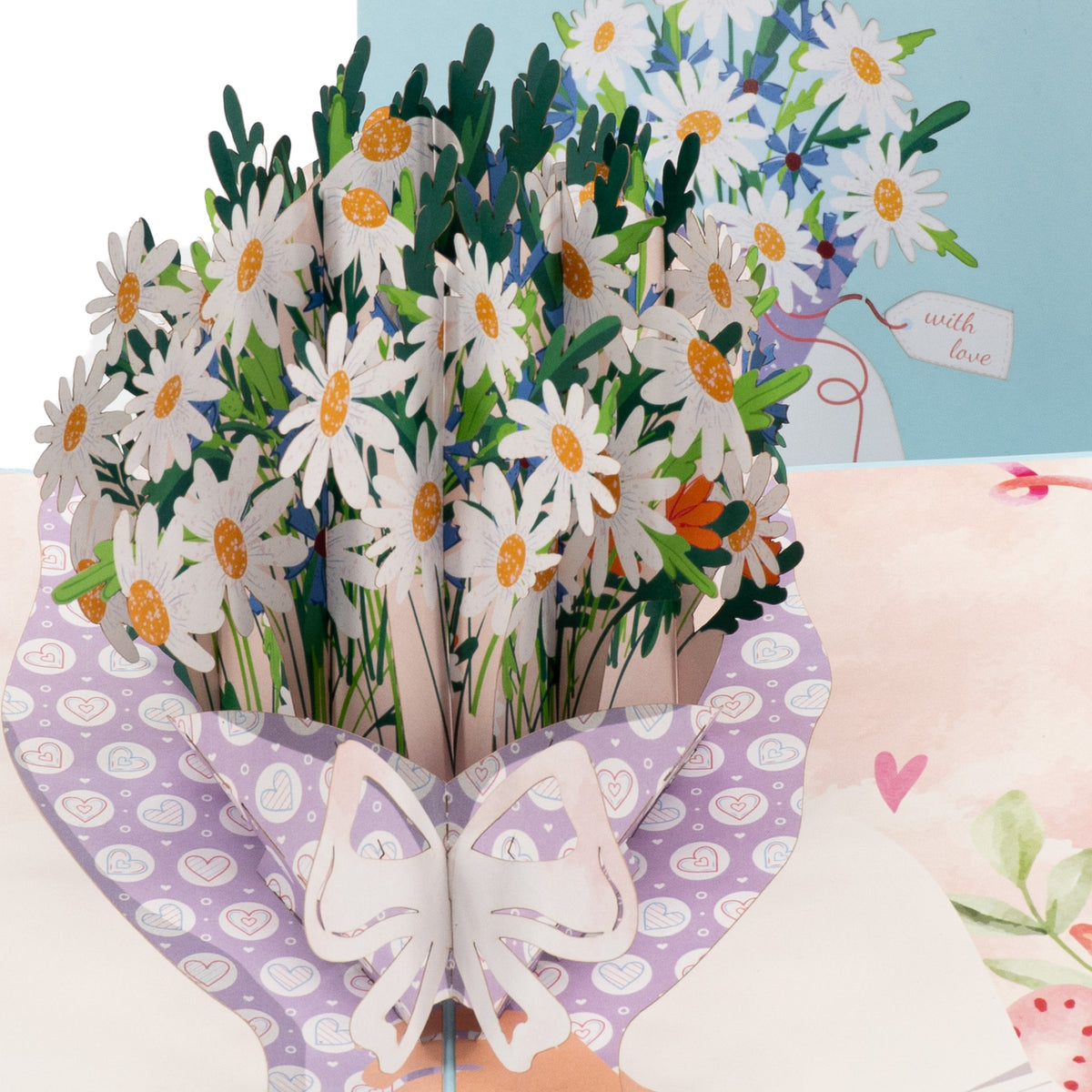 Daisy Days 3D pop-up card close-up: white daisies and cornflowers in heart-print wrap with bow, everpop