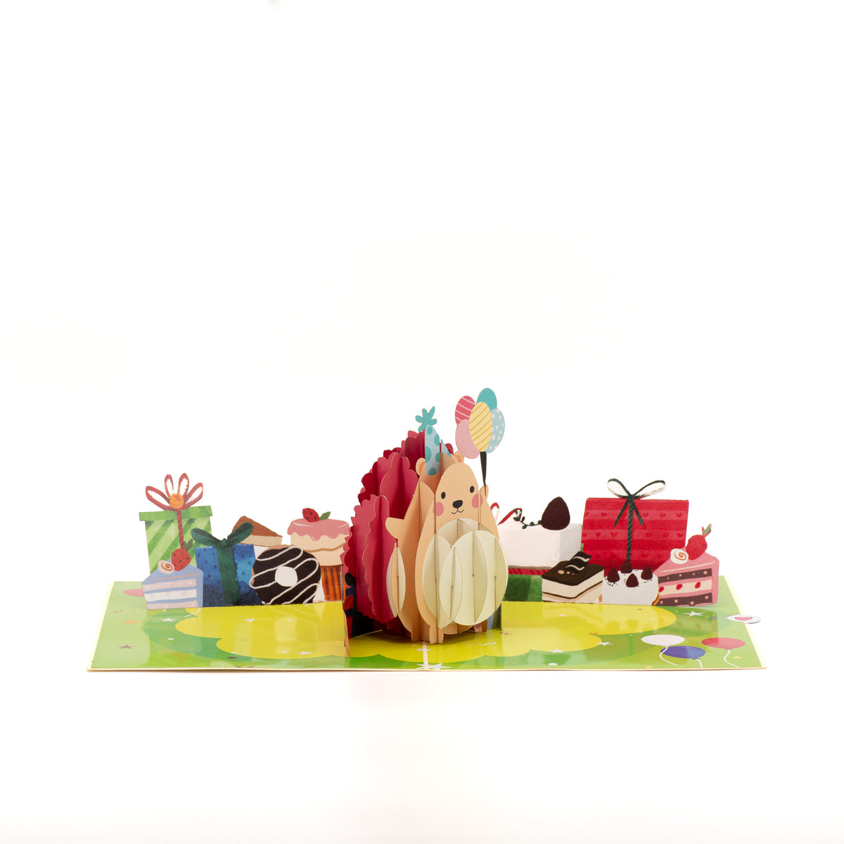 Happy Hedgehog Birthday 3D pop-up card angle view: birthday hedgehog pop-up on a green lawn with presents, everpop