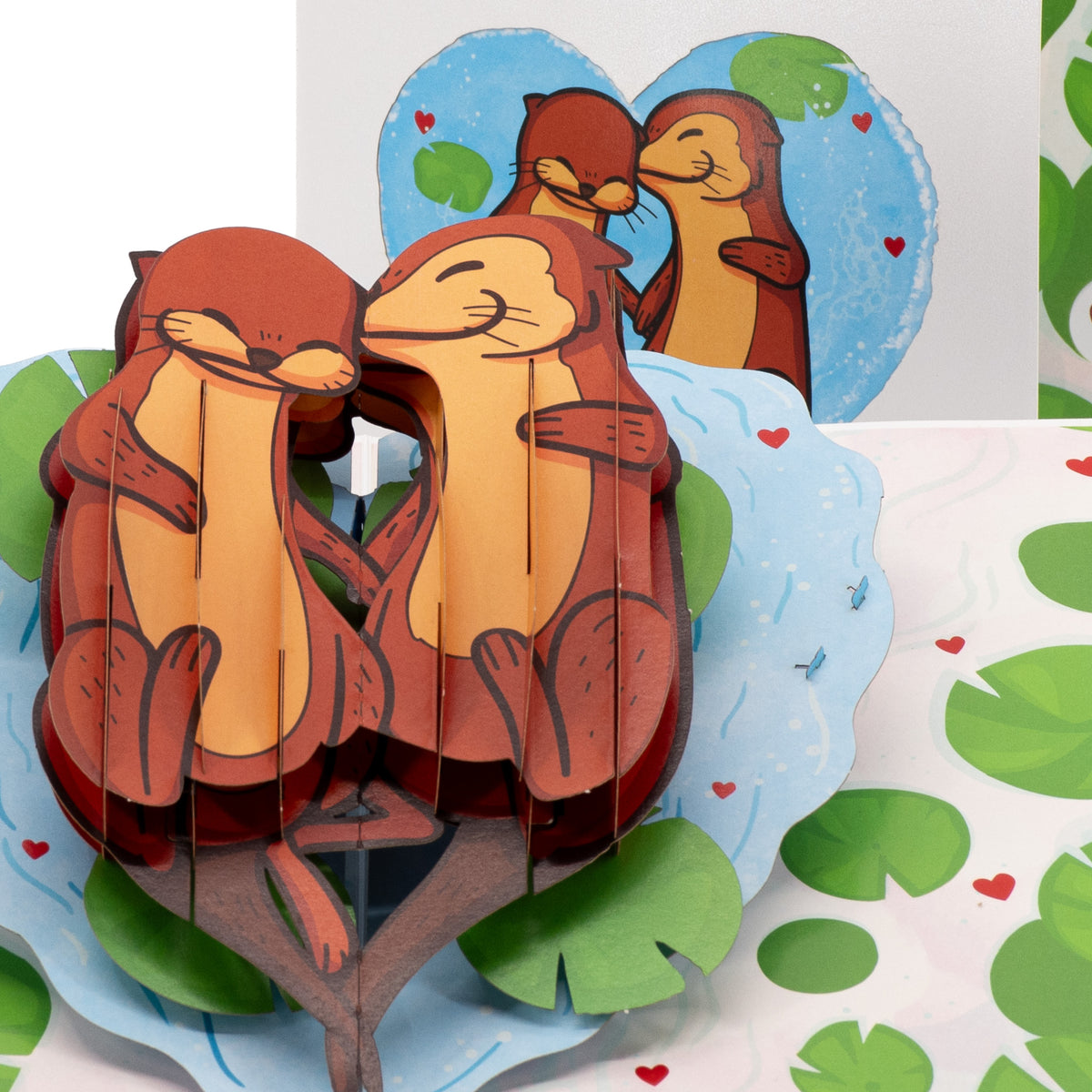 Holding On 3D pop-up card close-up: otter couple snoozing hand in hand on the water, everpop