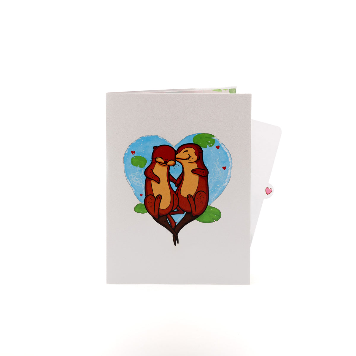 Holding On 3D pop-up card closed — card only, white cover with otters inside a blue heart, everpop