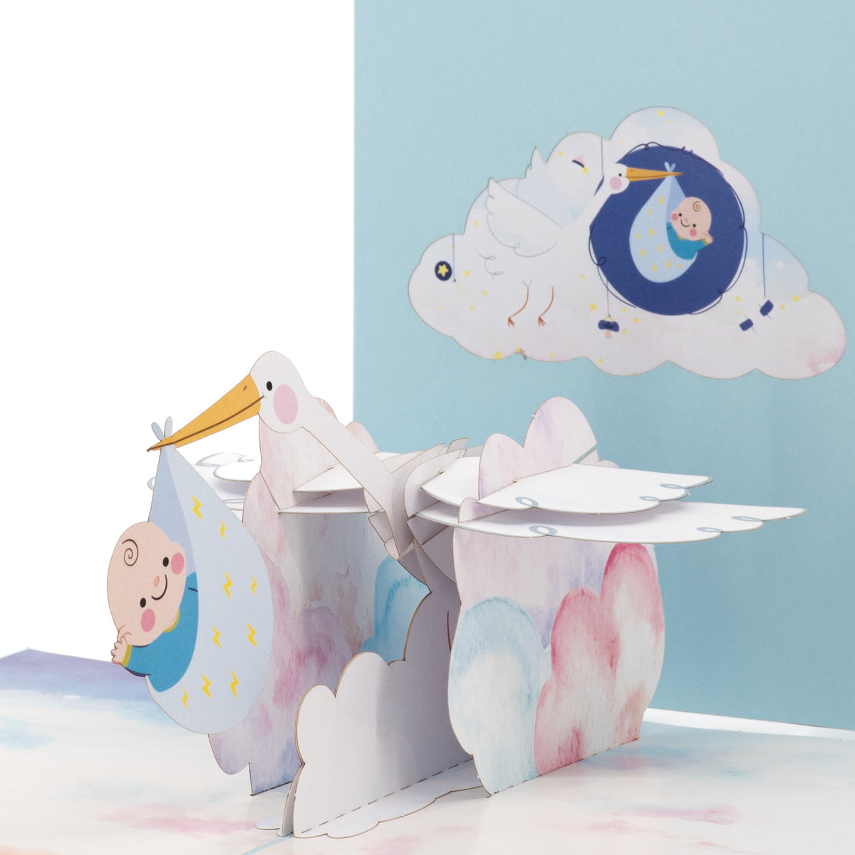It's a Boy! Stork 3D pop-up card close-up: white stork with baby in a blue bundle over clouds, everpop