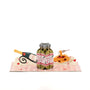 Olive You 3D pop-up card angle view: olive jar pop-up with spaghetti on pink gingham, everpop