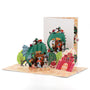 Once Upon an Island 3D pop-up card front view: dragon on a tower with knight and wizard, cover behind, everpop