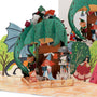 Once Upon an Island 3D pop-up card close-up: green dragon stacked with books above fairytale readers, everpop