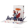 Superdad 3D pop-up card front view: dad and kids over SuperDad lettering, cover behind, everpop