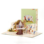 The Treehouse 3D pop-up card front view: kids playing in a treehouse, bubbles cover behind, everpop