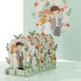 Through the Garden Gate 3D pop-up card close-up: couple holding hands beneath a rose and daisy arch, everpop
