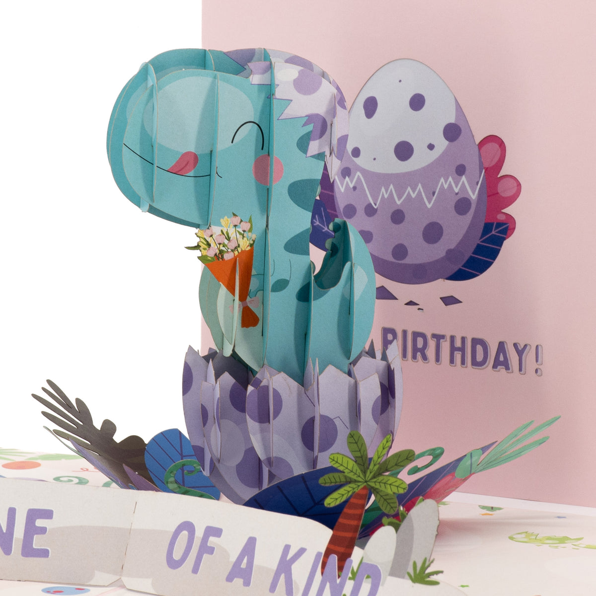 You're One of a Kind Birthday 3D pop-up card close-up: teal dino in a spotted egg over a One of a Kind banner, everpop